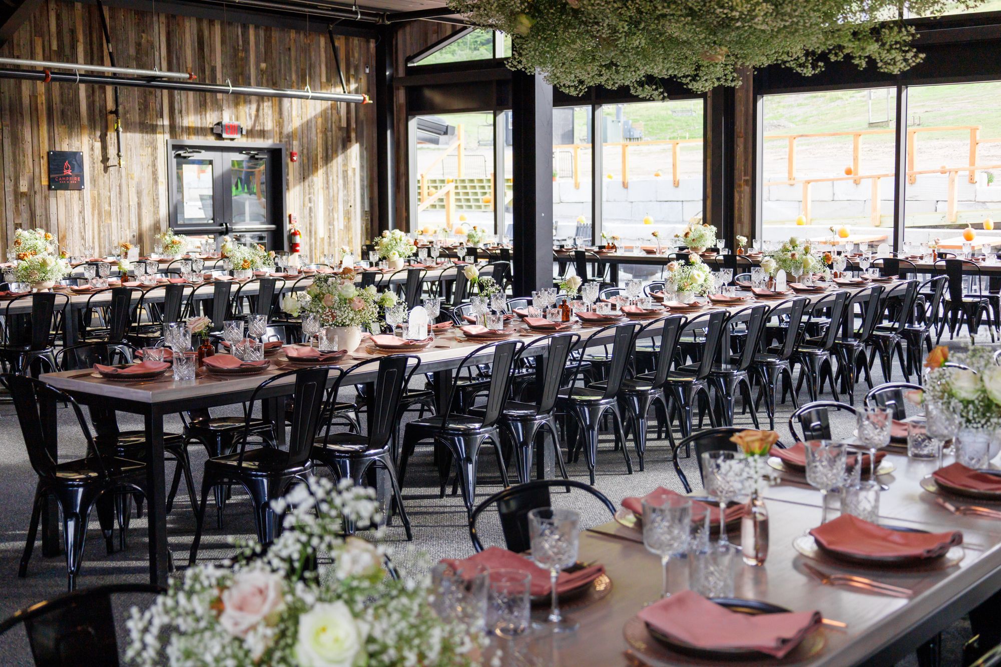 Tables set for a wedding reception in the Catamount Resort Lodge